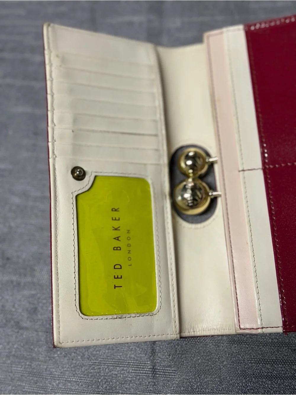 Ted Baker glossy red patent leather kiss-lock wallet with gold hardware